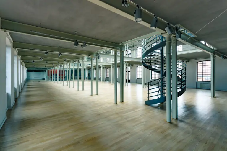 industrial-interior-with-round-stairs-2024-10-18-09-44-35-utc-min.jpg
